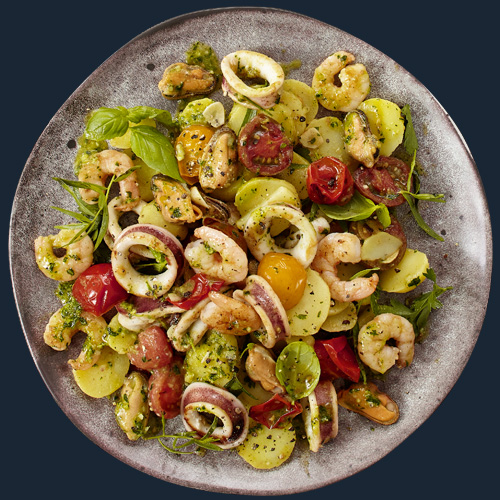 Frutti di Mare auf lauwarmem Kartoffel-Pesto-Salat